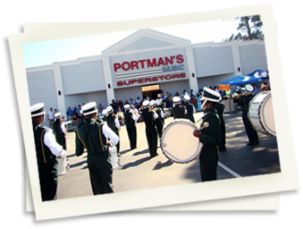 marching band in front of Portman's Music